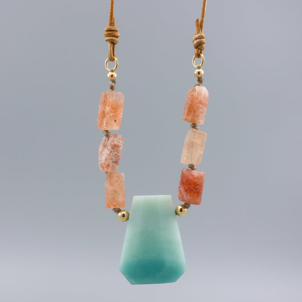 detail of handmade amazonite, sunstone, and gold fill necklace