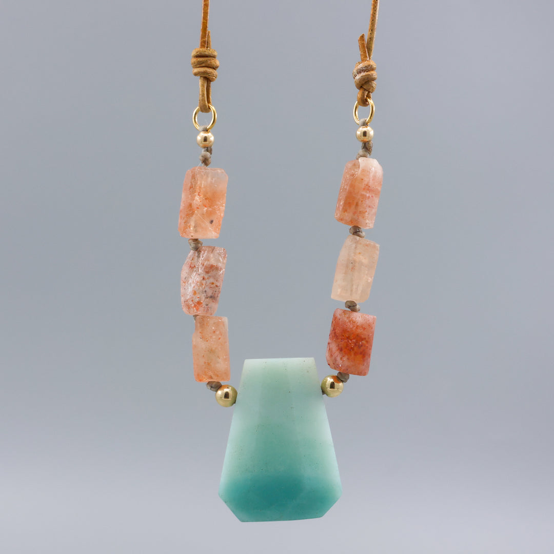 detail of handmade amazonite, sunstone, and gold fill necklace