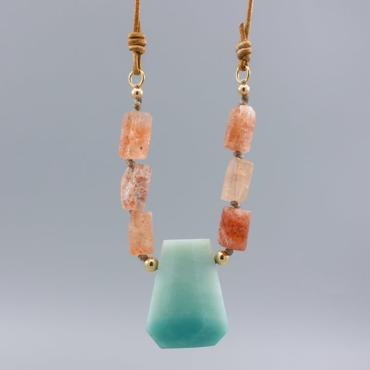 detail of handmade amazonite, sunstone, and gold fill necklace