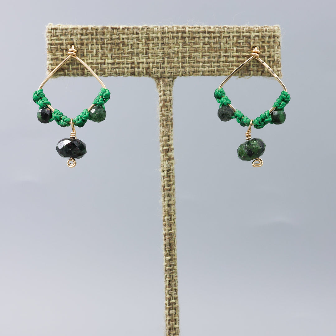 Handmade macrame earrings with gold fill and ruby zoisite beads on a linen hanger