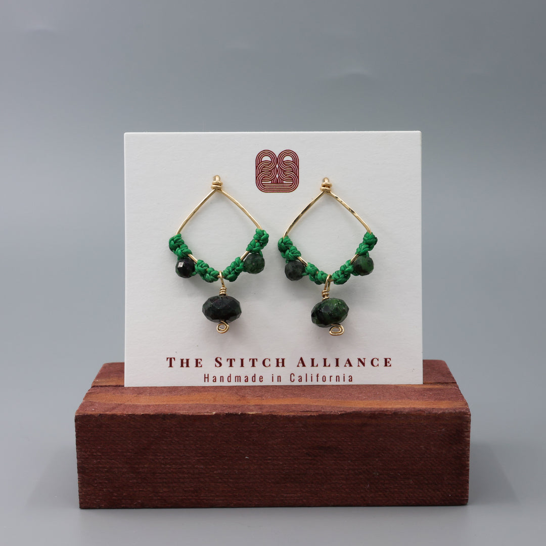 Handmade macrame earrings with gold fill and ruby zoisite beads on a white card
