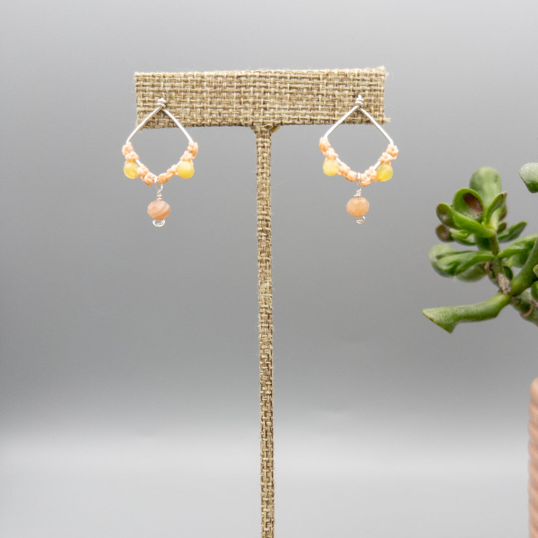 handmade sterling silver, peach moonstone, and yellow opal macrame earrings