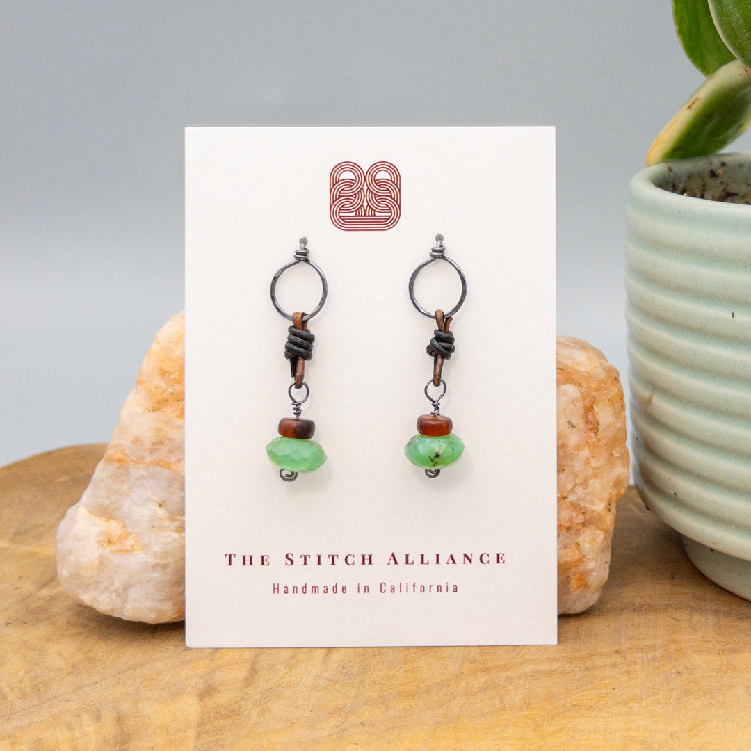 chrysoprase and horn leather and sterling silver earrings on white card