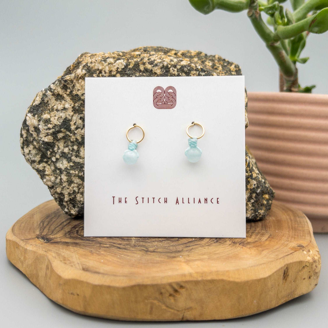 14k gold filled post style earrings with an aquamarine bead