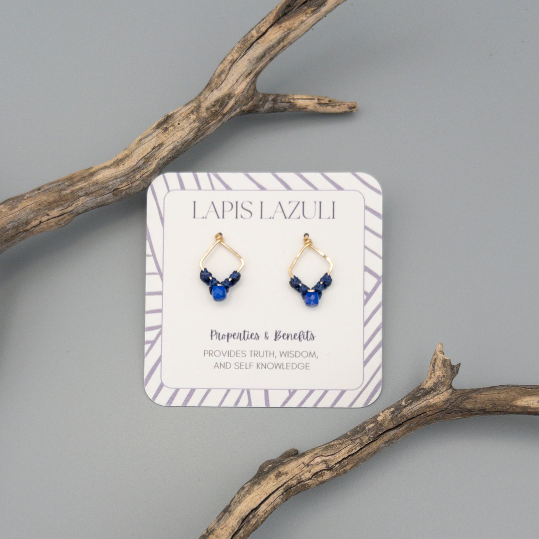 healing lapis lazuli crystal earrings handmade gold filled on a gray background
