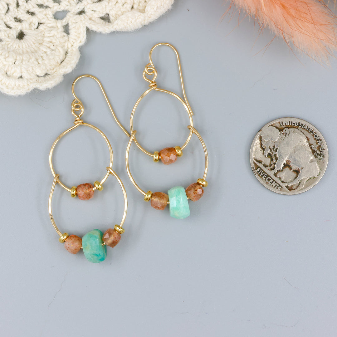 handmade gold fill double hoop earrings with amazonite and sunstone beads with a nickel or size comparison