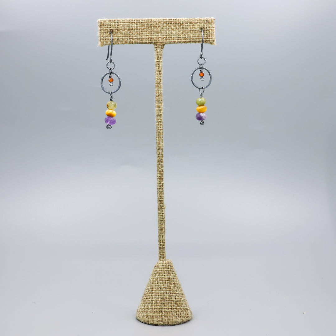 handmade oxidized sterling silver, amethyst, golden tigers eye, green garnet, and hessonite dangle earrings full view