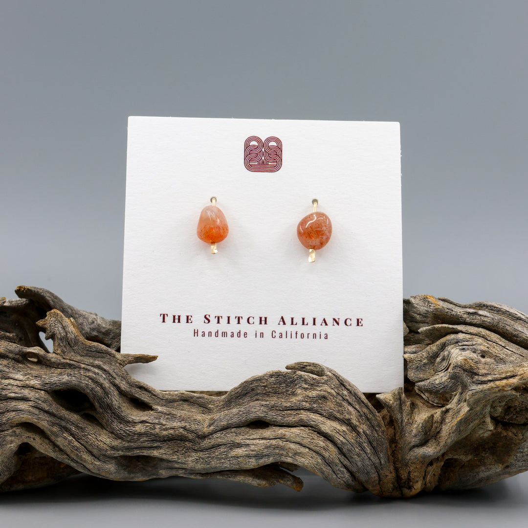 handmade sunstone gold fill stud earrings on a white card