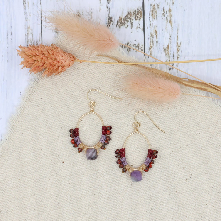 handmade 14k gold filled hoops with macrame and an amethyst bead