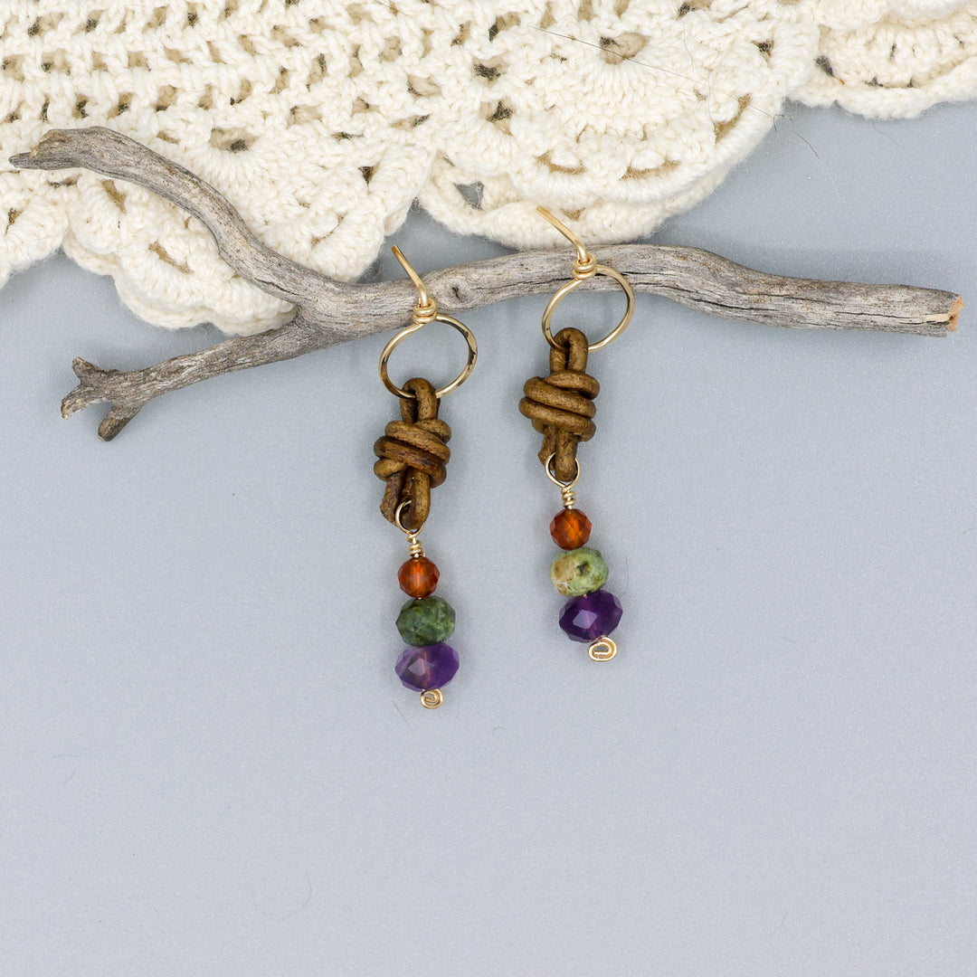 handmade amethyst, green garnet, and hessonite leather and gold fill earrings