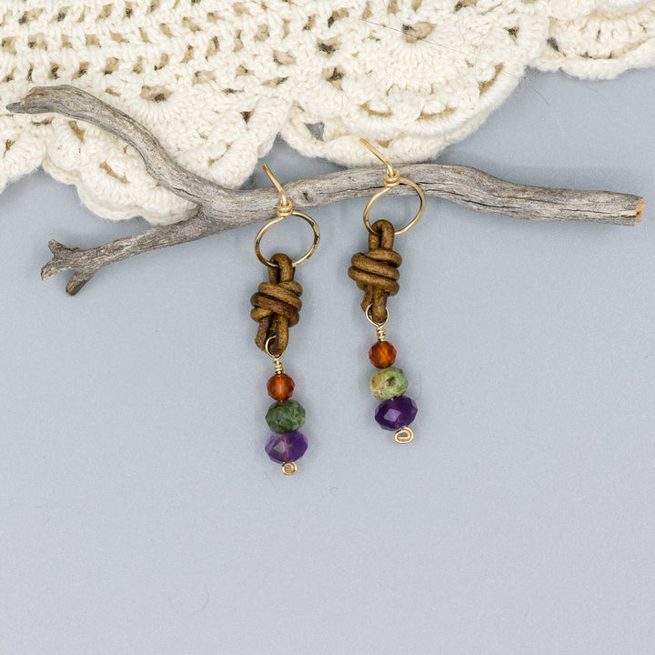 handmade amethyst, green garnet, and hessonite leather and gold fill earrings