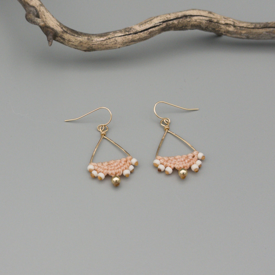 handmade triangle hoop peach macrame earrings gold fill  on a gray background