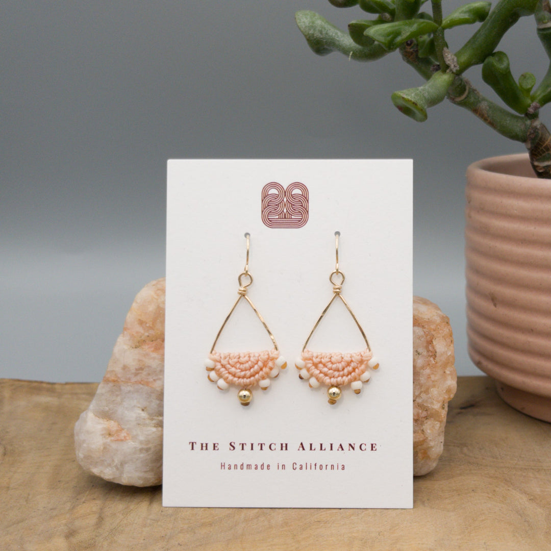 handmade triangle hoop peach macrame earrings gold fill  on a white card