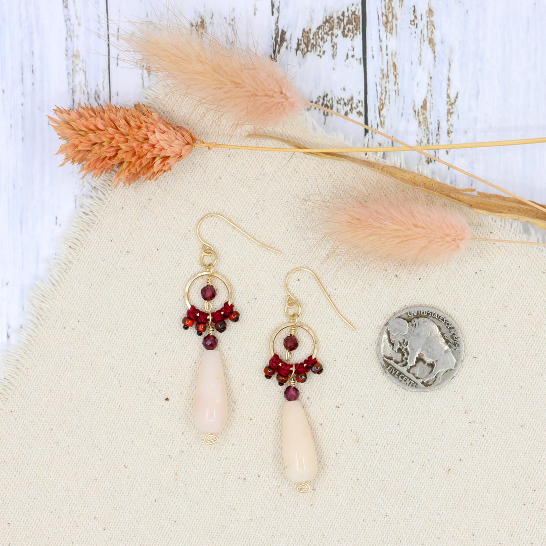 handmade 14k gold fill dangle earrings with pink opal and garnet beads with coin for size comparison