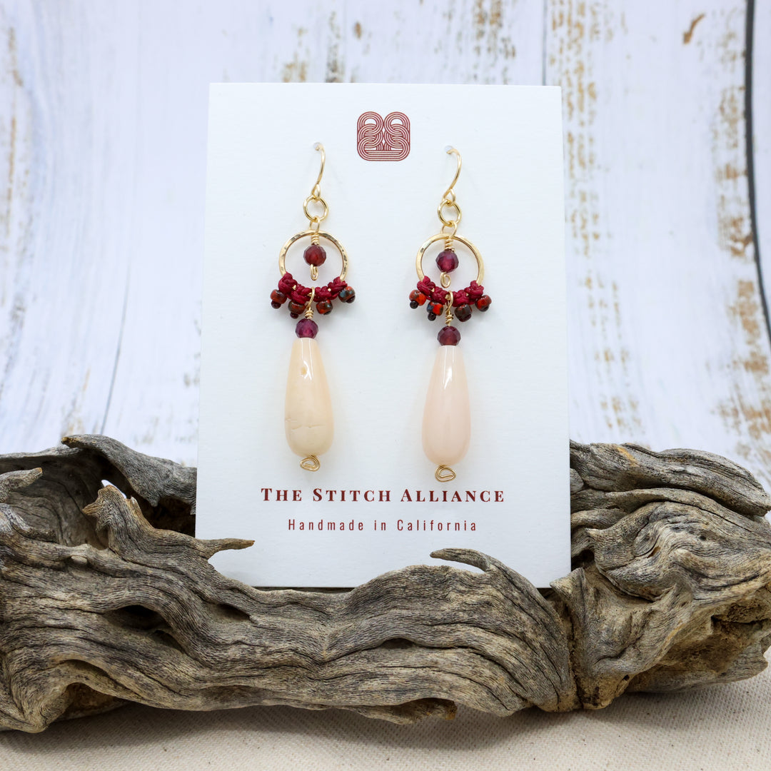 handmade 14k gold fill dangle earrings with pink opal and garnet beads on white card