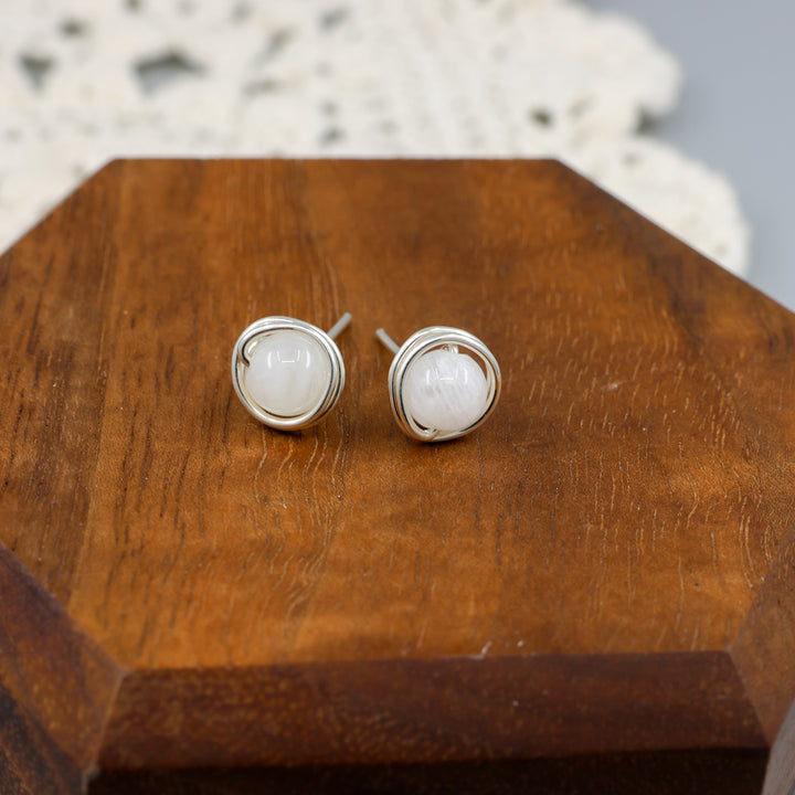 handmade moonstone and sterling silver wire wrapped stud earrings detail view