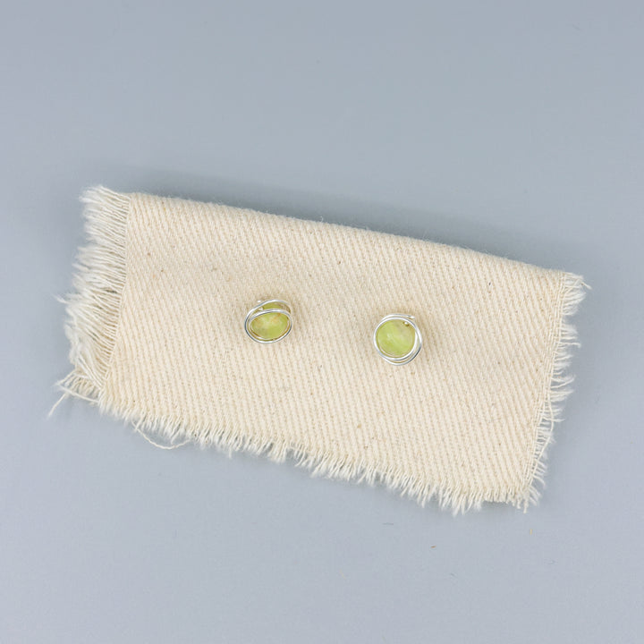 handmade Sterling silver peridot stud earrings overhead view