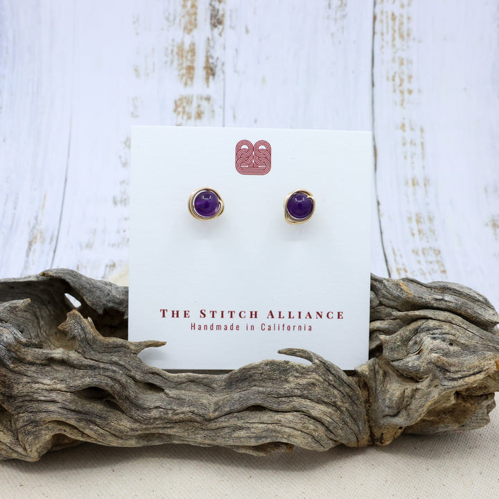 handmade amethyst and gold filled stud earrings on a white card
