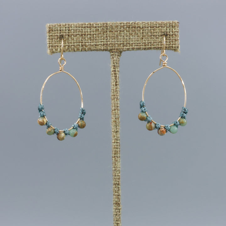 handmade gold hoop macrame earrings with aqua terra jasper beads