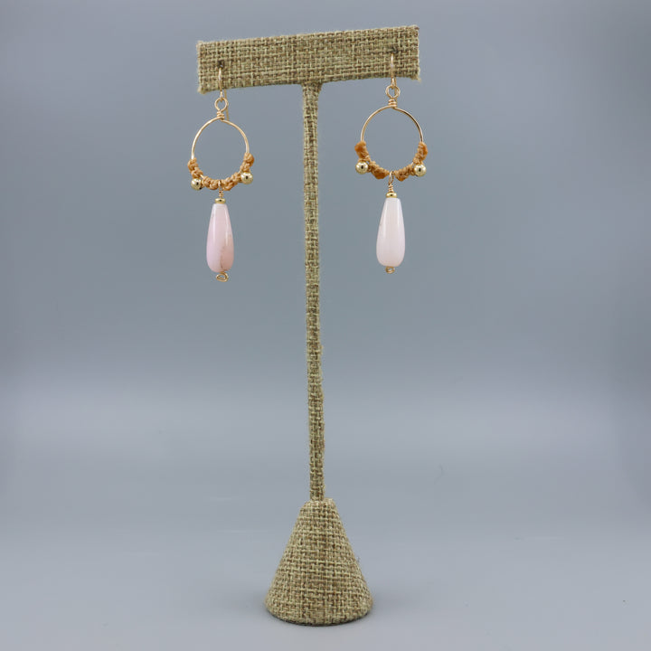 handmade pink opal macrame gold fill hoop earrings on a linen hanger