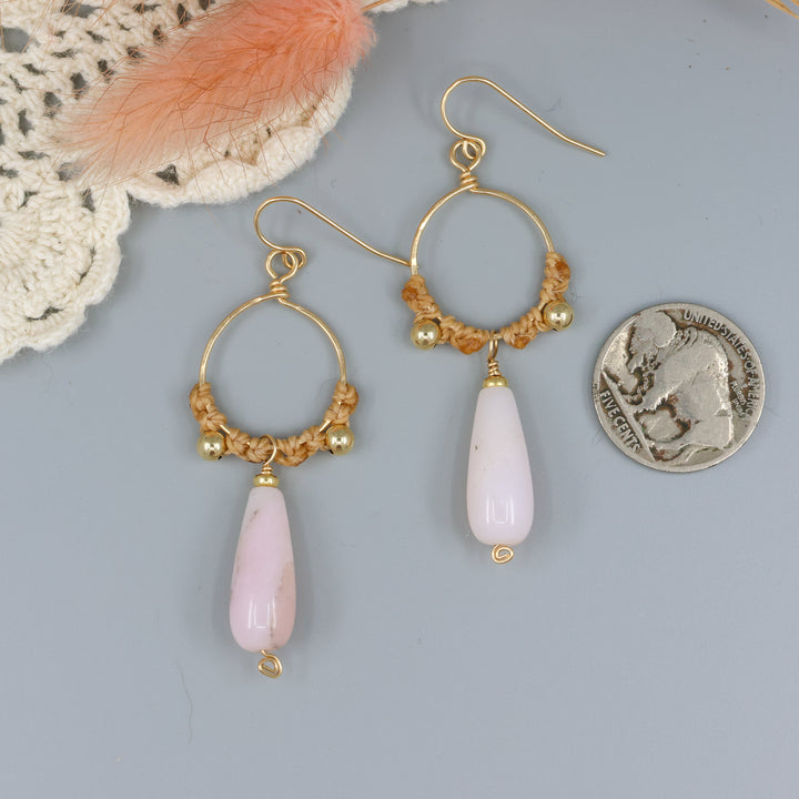 handmade pink opal macrame gold fill hoop earrings with a nickel for size comparison