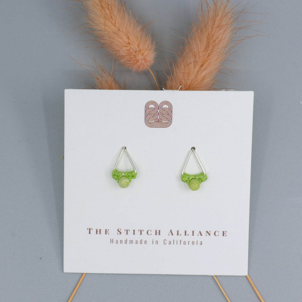 handmade peridot stud earrings sterling silver triangle on white card