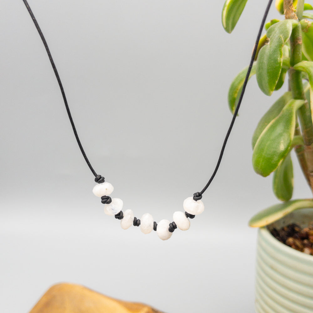 hand knotted rainbow moonstone beaded necklace on black leather with sterling silver clasp