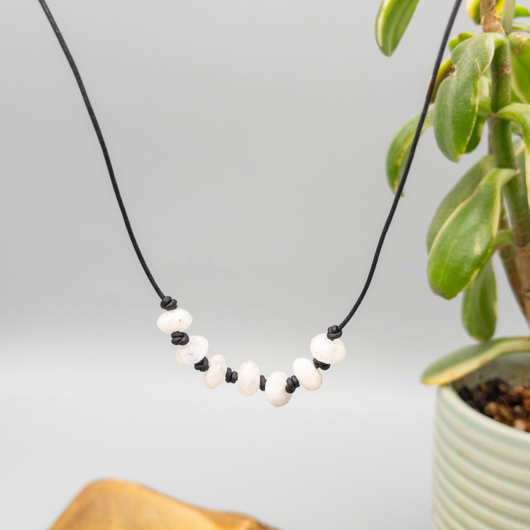 hand knotted rainbow moonstone beaded necklace on black leather with sterling silver clasp