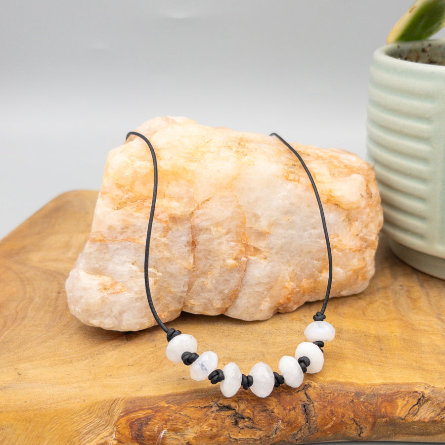 hand knotted rainbow moonstone beaded necklace on black leather with sterling silver clasp