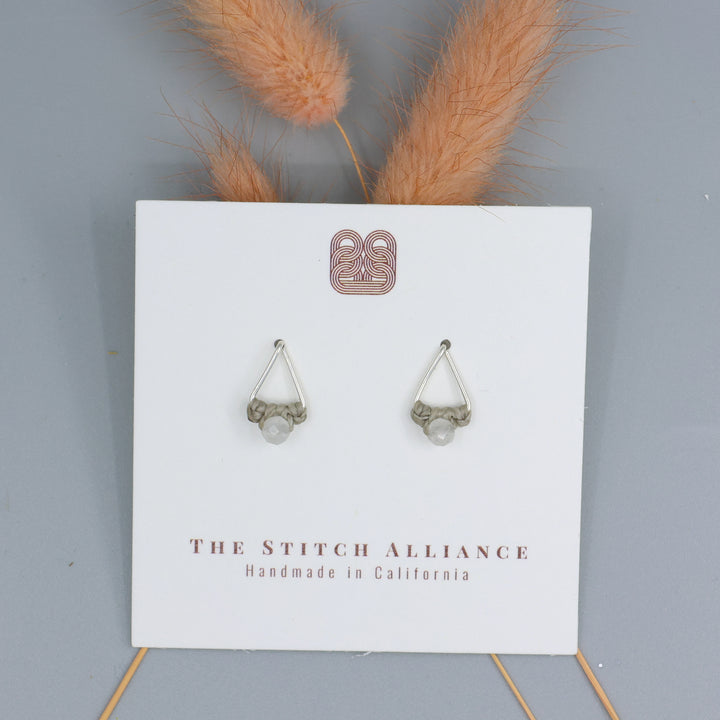 rainbow moonstone studs sterling silver triangle on a white card