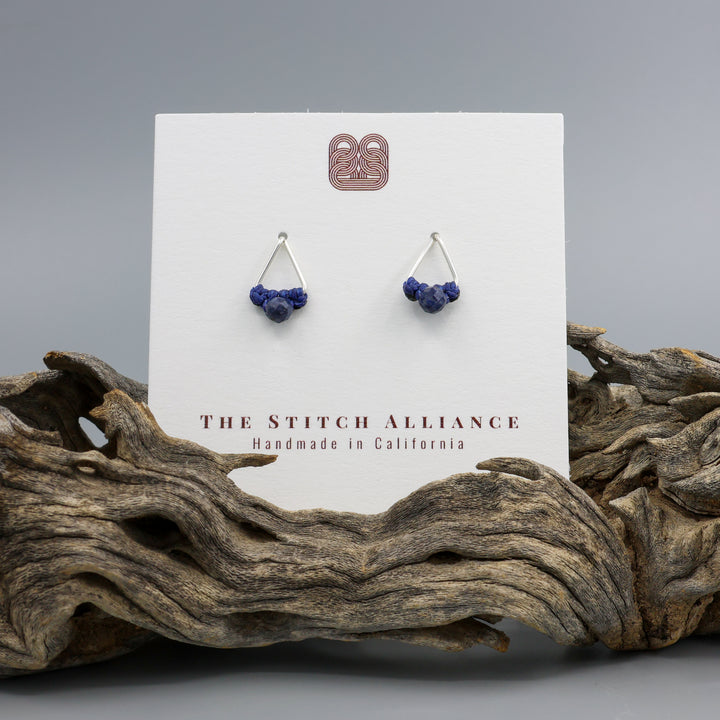 handmade sapphire stud earrings sterling silver triangle on a white card