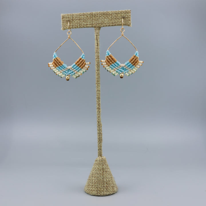handmade square hoop macrame earrings gold fill and coastal colors on a linen hanger