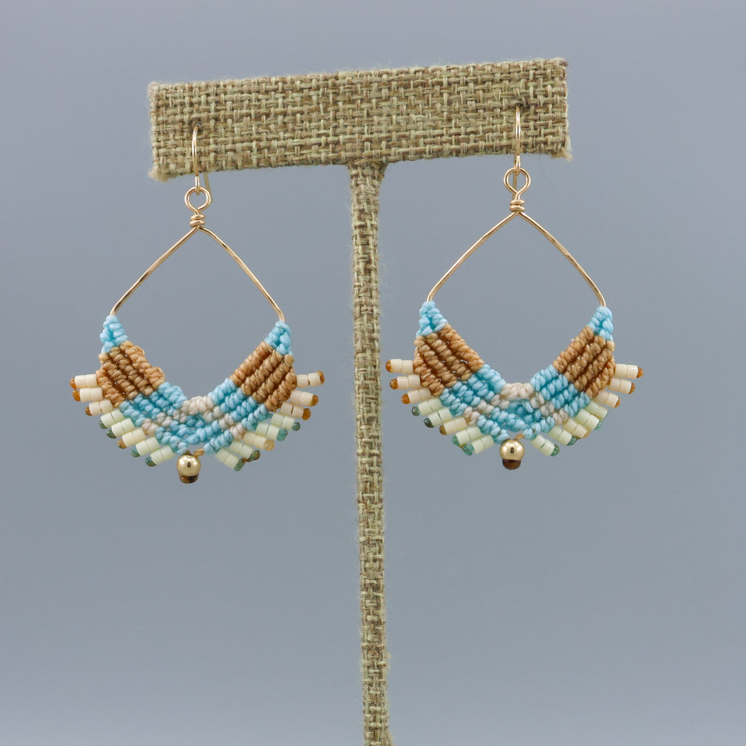 handmade square hoop macrame earrings gold fill and coastal colors on a linen hanger