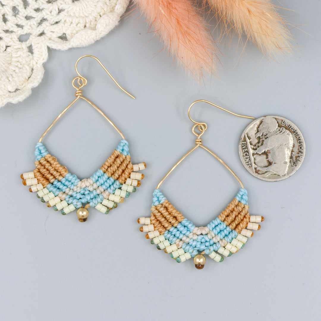 handmade square hoop macrame earrings gold fill and coastal colors with a nickel for size comparison