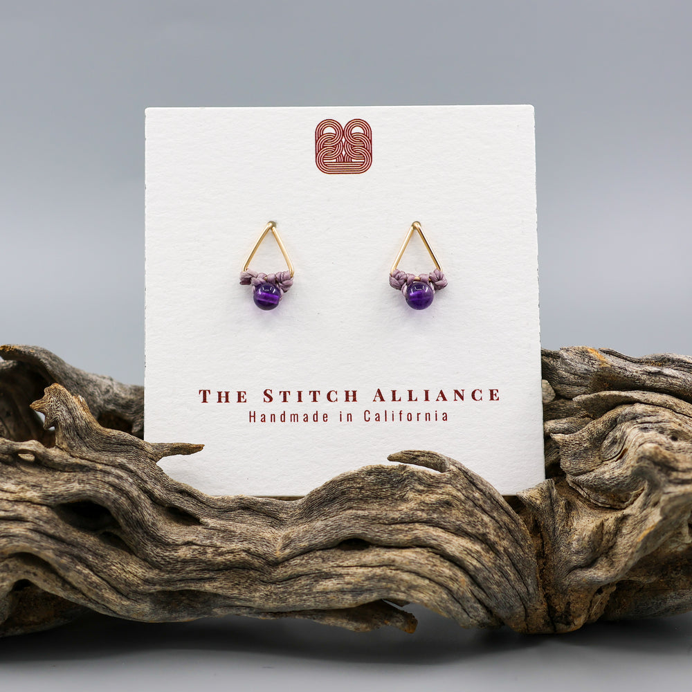 handmade gold fill amethyst triangle stud earrings on a white card