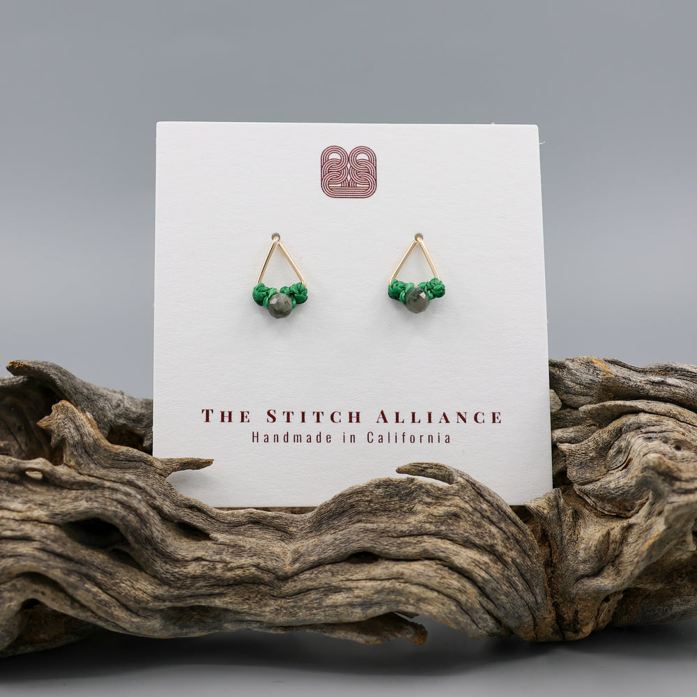 handmade gold fill  triangle stud earrings with emerald beads on a white card