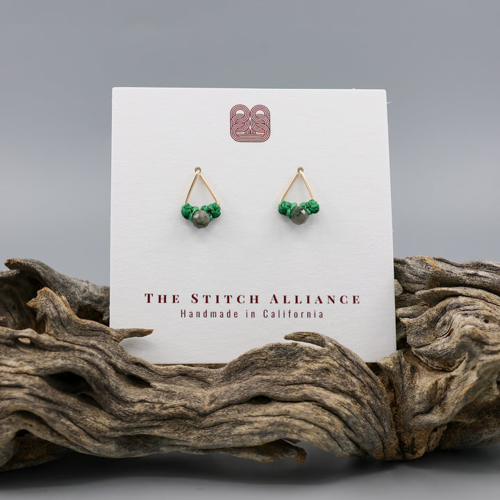 handmade gold fill  triangle stud earrings with emerald beads on a white card