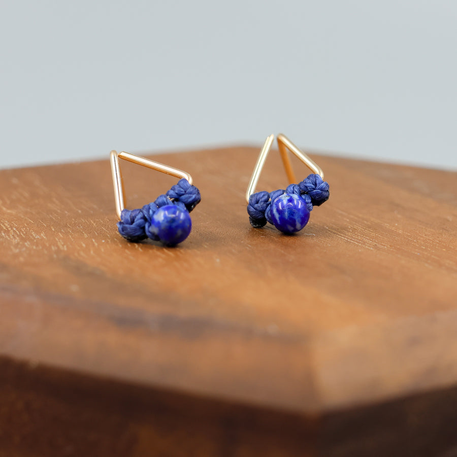 handmade triangle shaped earrings in gold fill with a lapis lazuli bead