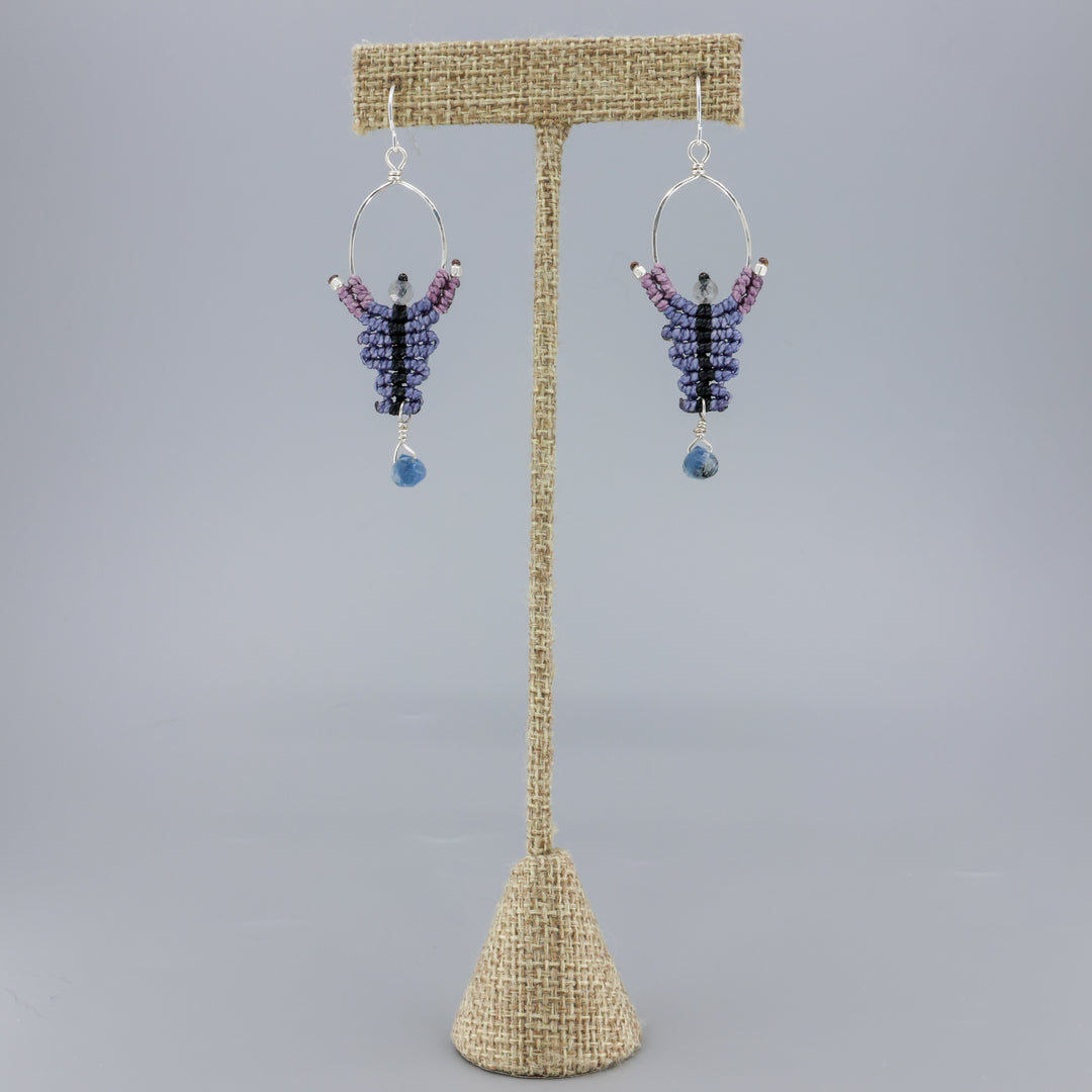 handmade macrame earrings, sterling silver hoops with kyanite and labradorite beads shown on a linen hanger