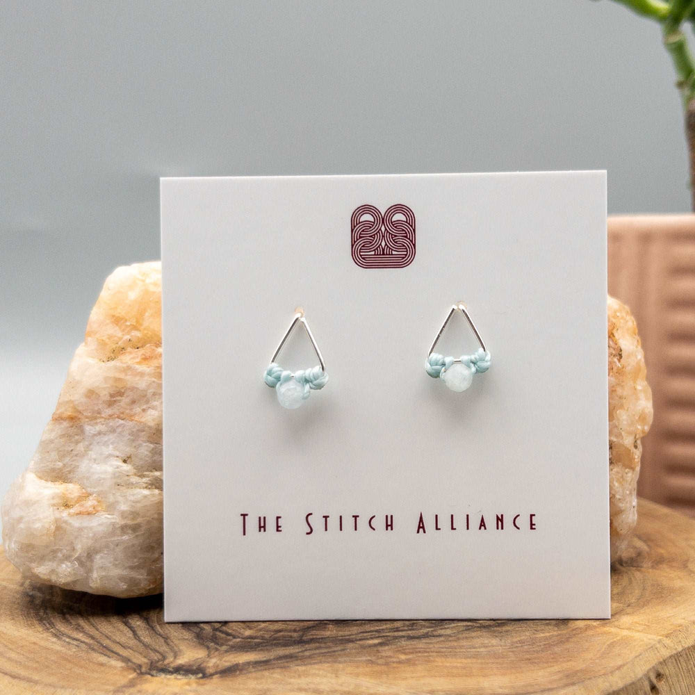 Triangle shaped post style earrings in sterling silver with aquamarine beads
