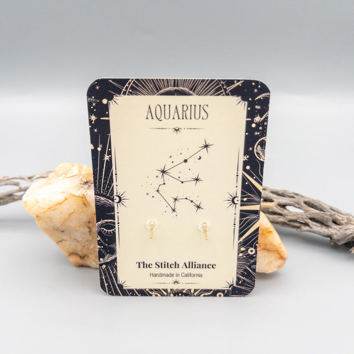 Aquarius garnet gold filled zodiac earrings back of card