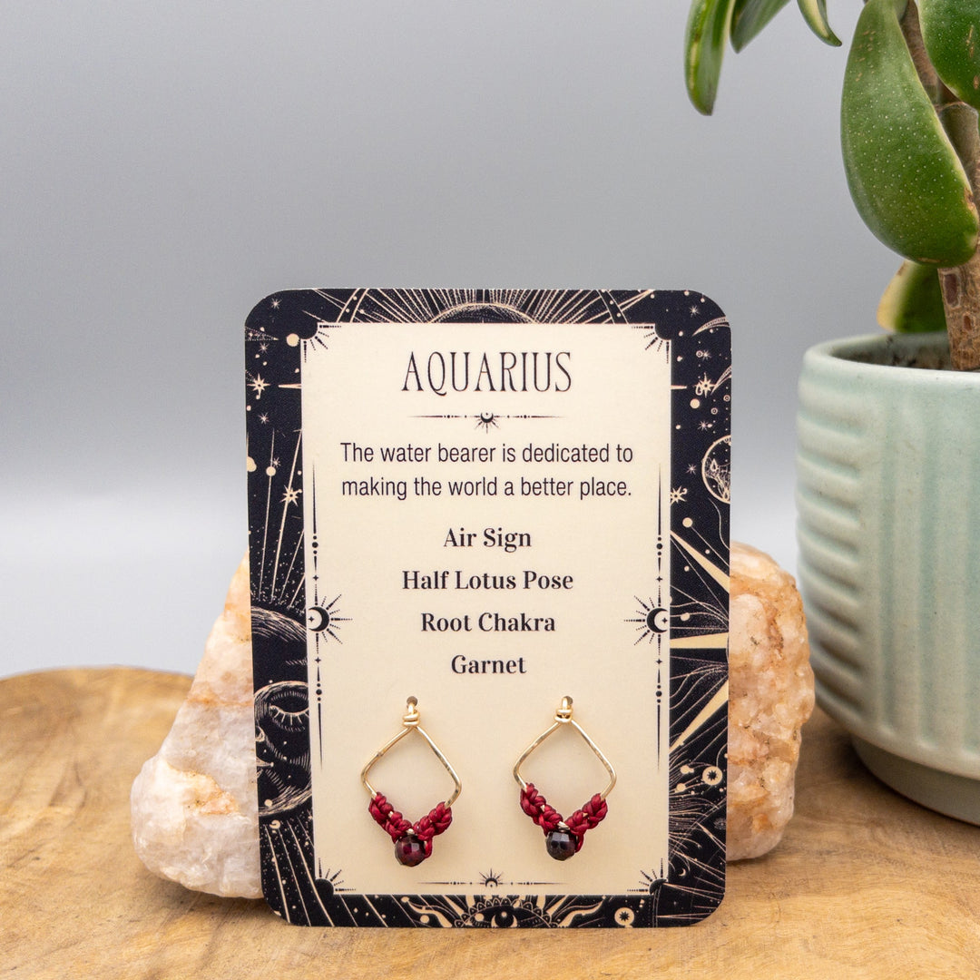 Aquarius garnet gold filled zodiac earrings front of card