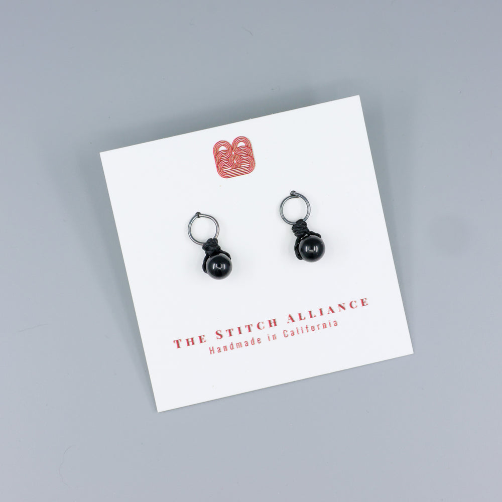 black spinel mini dangle earring oxidized sterling silver on a white card