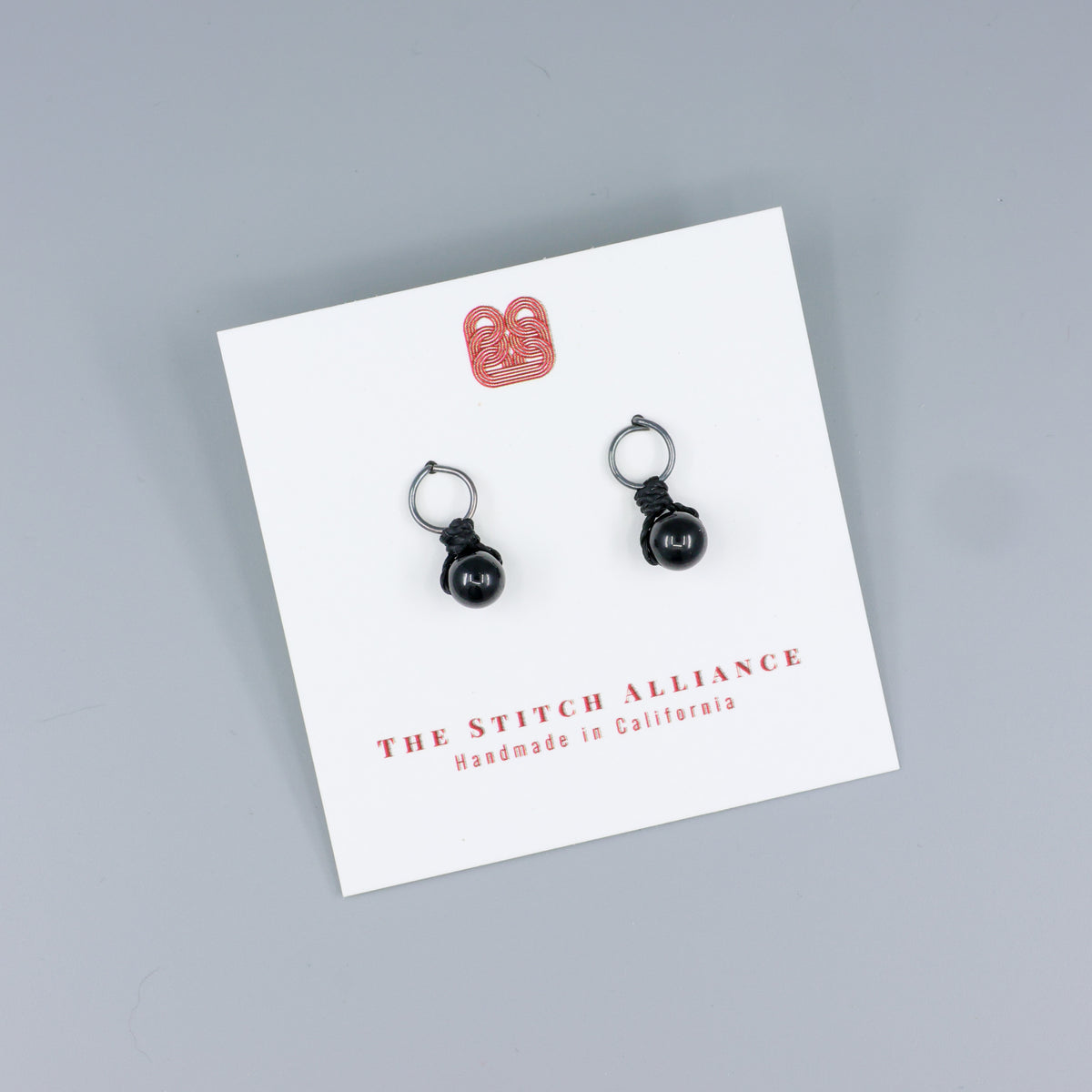 black spinel mini dangle earring oxidized sterling silver on a white card