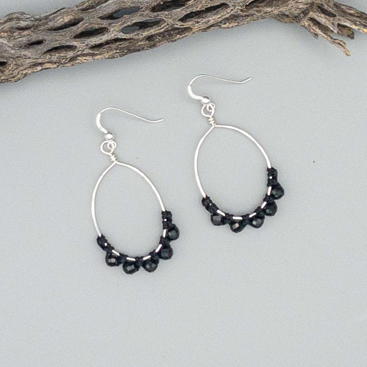 sterling silver oval hoop earrings made wiht black spinel beads