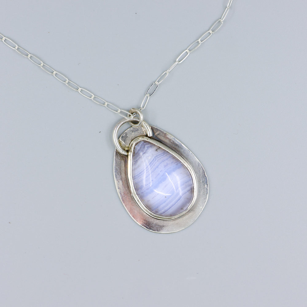 blue lace agate sterling silver one of a kind necklace overhead view