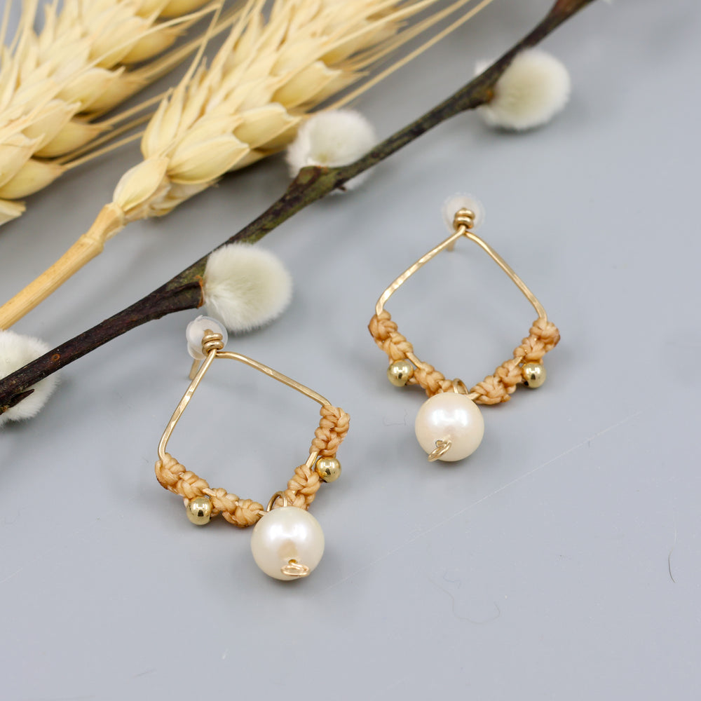 handmade macrame gold and freshwater pearl earrings overhead view