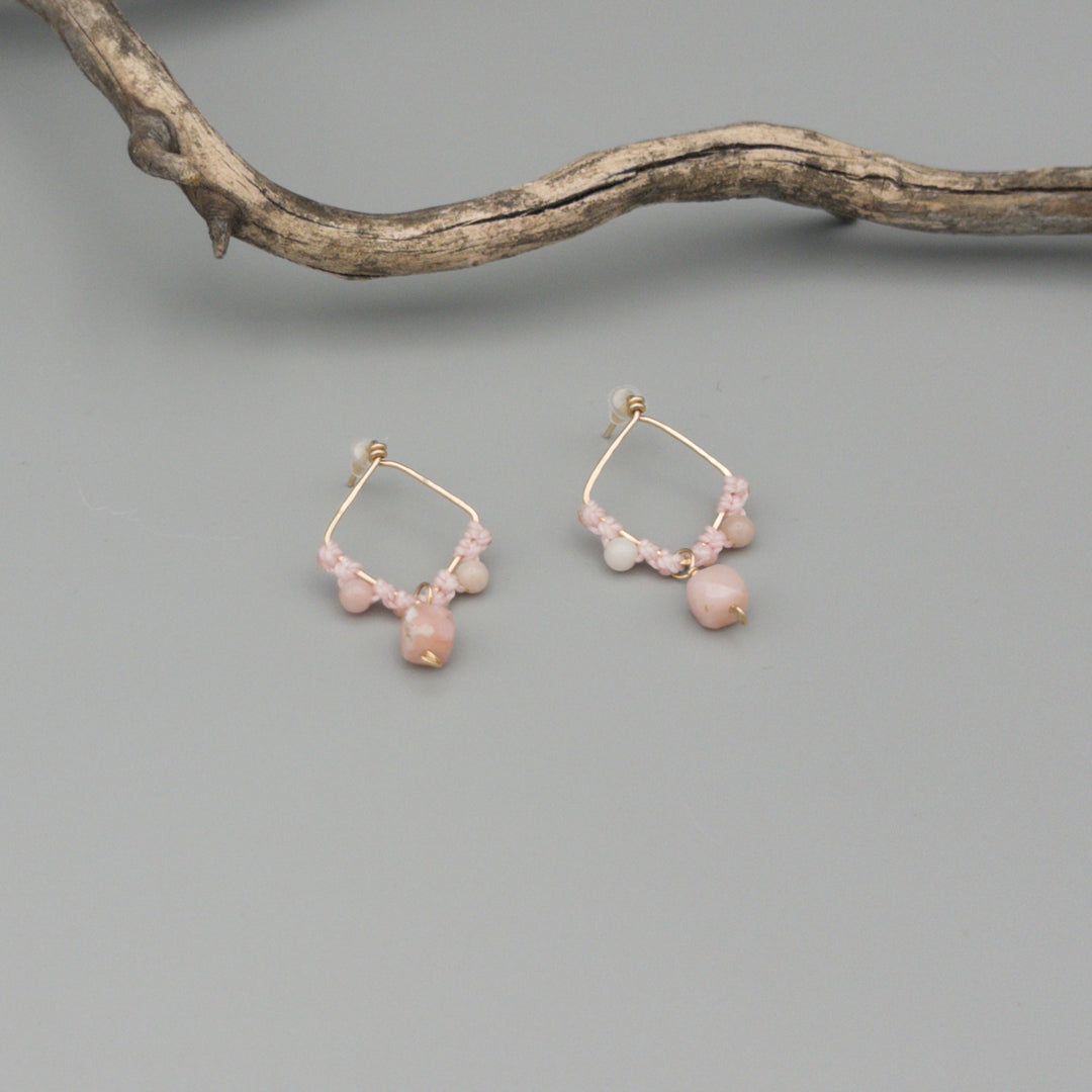 pink opal gold filled macrame earrings on a gray background