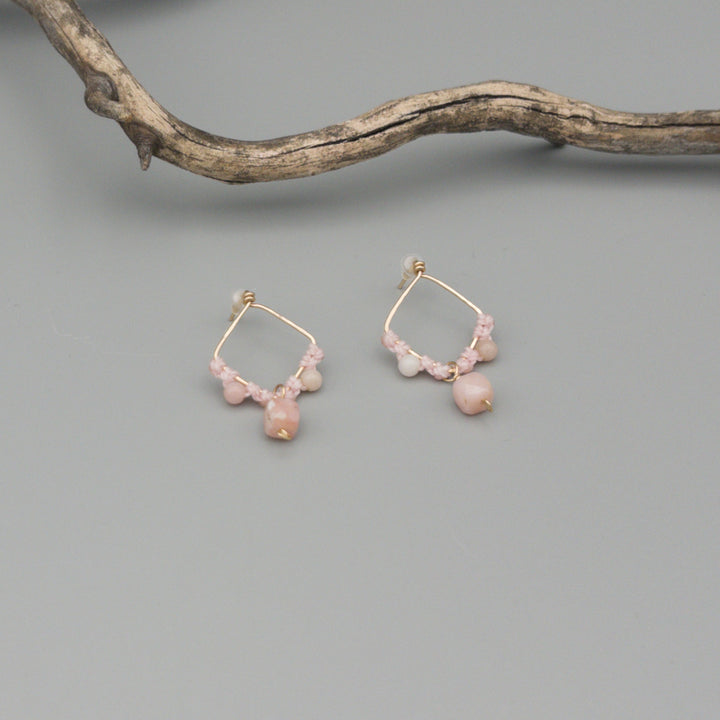 pink opal gold filled macrame earrings on a gray background