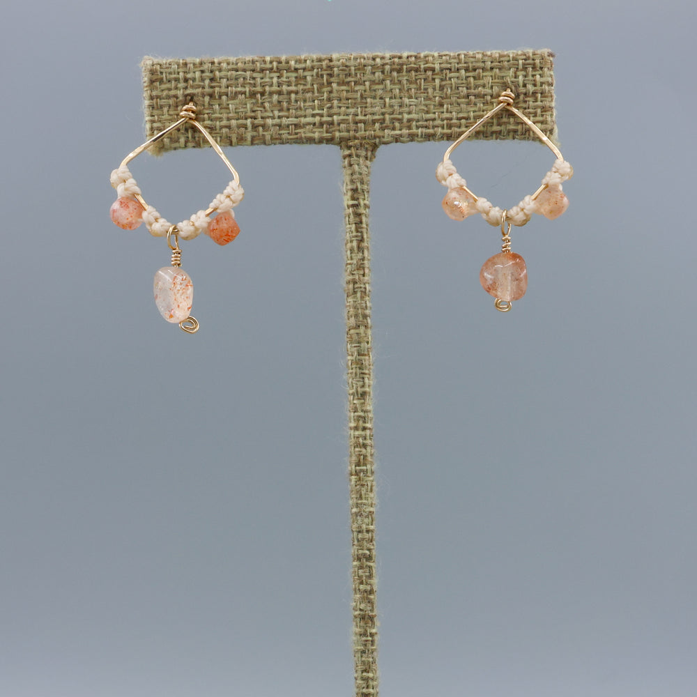 handmade gold fill and sunstone macrame earrings on a linen hanger
